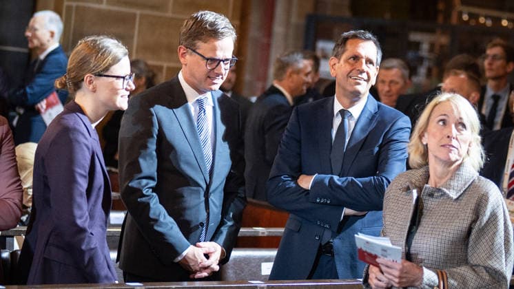 Ecumenical service at St. Petri Cathedral: Mira Schlüter, Office Manager; Carsten Linnemann, Federal Minister of Health; and Olaf Lies, Minister-President of Lower Saxony, from left toward the camera. Official central celebrations for German Unity Day 2026 in Bremen, Bremen, Germany, downtown