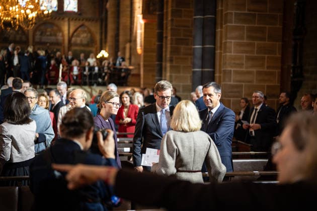 Ecumenical service at St. Petri Cathedral: Mira Schlüter, Office Manager; Carsten Linnemann, Federal Minister of Health; and Olaf Lies, Minister-President of Lower Saxony, from left toward the camera. Official central celebrations for German Unity Day 2026 in Bremen, Bremen, Germany, downtown