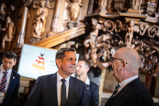 Ecumenical service at St. Petri Cathedral: Olaf Lies, Minister-President of Lower Saxony, with Dietmar Woidke, Minister-President of Brandenburg (from left). Official central celebrations for German Unity Day 2026 in Bremen, Bremen, Germany, downtown
