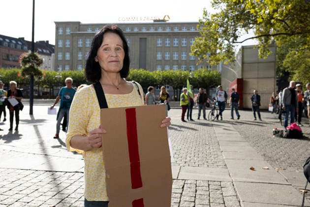 October 3, 2026 Press event: Es brennt initiative—human chain in Dortmund, Hansaplatz. Angelika Temiszewski of the Animal Protection Party supports the event in Dortmund at Hansaplatz and Westenhellweg, North Rhine-Westphalia, Germany