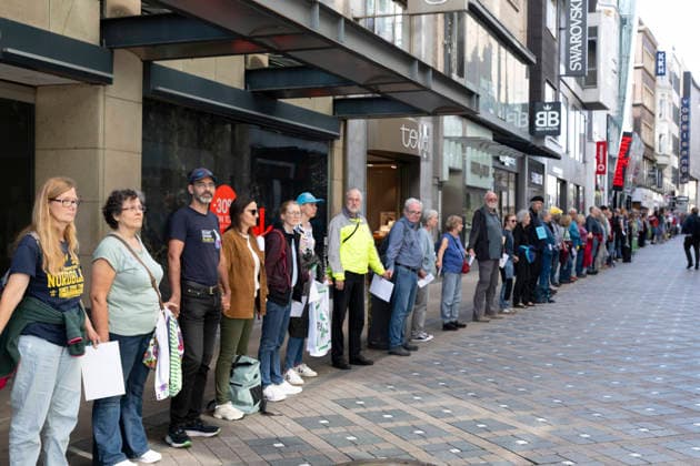 October 3, 2026 Press event: Es brennt initiative—human chain in Dortmund, Hansaplatz; participants on Westenhellweg, Dortmund; Hansaplatz and Westenhellweg, North Rhine-Westphalia, Germany
