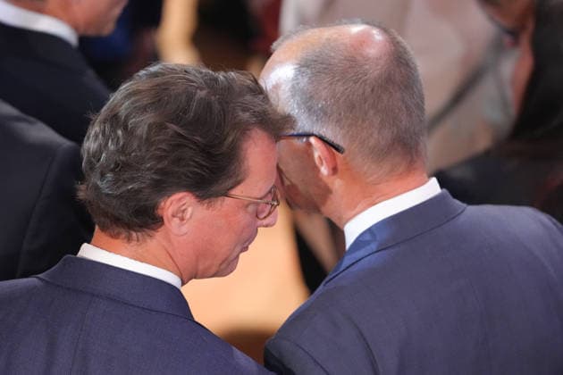 German Unity Day Ceremony in Bremen: Chancellor Friedrich Merz and North Rhine-Westphalia Minister-President Hendrik Wuest in conversation after the German Unity Day ceremony at the Glocke, Bremen, October 3, 2026, Bremen, Germany