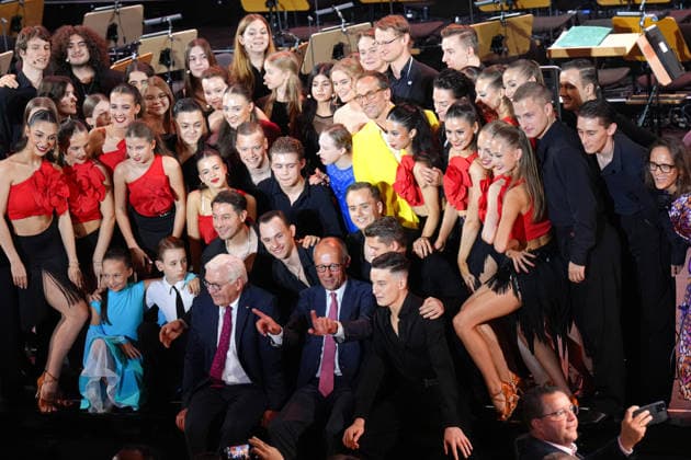 German Unity Day Ceremony in Bremen: Group photo with Chancellor Friedrich Merz and Federal President Frank Walter Steinmeier; the artists performing at the German Unity Day ceremony pose for a photo with the two heads of state after their performance, Bremen, October 3, 2026, Bremen, Bremen, Germany