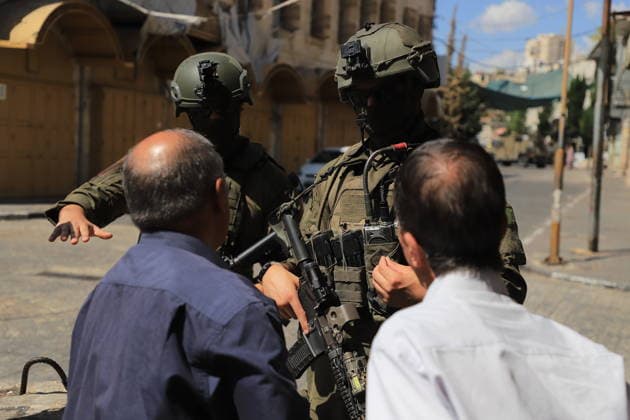 Israeli forces raid Hebron on Sukkot holiday HEBRON, WEST BANK, PALESTINE - OCTOBER 03: Israeli soldiers restrict the movement of Palestinians and take security measures as they raid the Old Town on the occasion of Sukkot feast in Hebron, West Bank, Palestine on October 03, 2026. Amer Shallodi Anadolu Hebron West Bank. Editorial use only. Please get in touch for any other usage. Copyright: x2026xAnadoluxAmerxShallodix