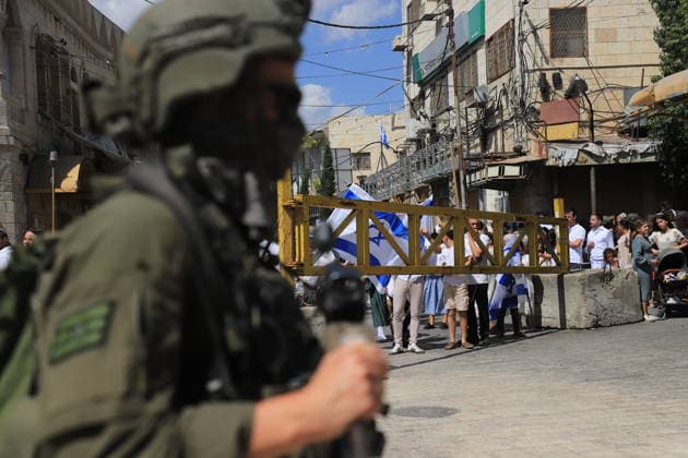 Israeli forces raid Hebron on Sukkot holiday HEBRON, WEST BANK, PALESTINE - OCTOBER 03: Israeli soldiers restrict the movement of Palestinians and take security measures as they raid the Old Town on the occasion of Sukkot feast in Hebron, West Bank, Palestine on October 03, 2026. Amer Shallodi Anadolu Hebron West Bank. Editorial use only. Please get in touch for any other usage. Copyright: x2026xAnadoluxAmerxShallodix