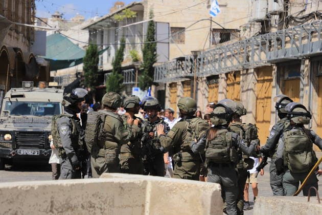 Israeli forces raid Hebron on Sukkot holiday HEBRON, WEST BANK, PALESTINE - OCTOBER 03: Israeli soldiers restrict the movement of Palestinians and take security measures as they raid the Old Town on the occasion of Sukkot feast in Hebron, West Bank, Palestine on October 03, 2026. Amer Shallodi Anadolu Hebron West Bank. Editorial use only. Please get in touch for any other usage. Copyright: x2026xAnadoluxAmerxShallodix