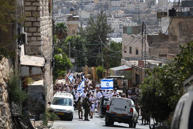 Israeli Soldiers Restrict Palestinian Movement During Settler Tour in Hebron Israeli soldiers restrict the movement of Palestinians and take security measures during a tour by Israeli settlers in the Old City of Hebron, in the West Bank, on October 3, 2026, during the Jewish holiday of Sukkot. Photo by Mamoun Wazwaz apaimages Hebron West Bank Palestinian Territory 031026_Hebron_MW_00(11) Copyright: xapaimagesxMamounxWazwazx xapaimagesx