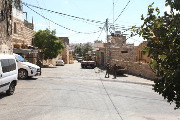 Israeli Soldiers Restrict Palestinian Movement During Settler Tour in Hebron Israeli soldiers restrict the movement of Palestinians and take security measures during a tour by Israeli settlers in the Old City of Hebron, in the West Bank, on October 3, 2026, during the Jewish holiday of Sukkot. Photo by Mamoun Wazwaz apaimages Hebron West Bank Palestinian Territory 031026_Hebron_MW_00(1) Copyright: xapaimagesxMamounxWazwazx xapaimagesx