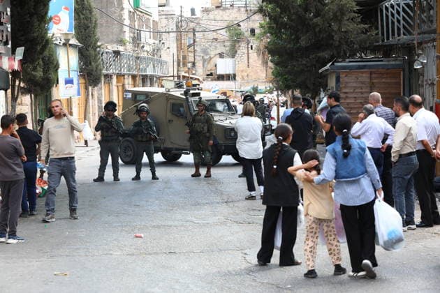 Israeli Soldiers Restrict Palestinian Movement During Settler Tour in Hebron Israeli soldiers restrict the movement of Palestinians and take security measures during a tour by Israeli settlers in the Old City of Hebron, in the West Bank, on October 3, 2026, during the Jewish holiday of Sukkot. Photo by Mamoun Wazwaz apaimages Hebron West Bank Palestinian Territory 031026_Hebron_MW_00(18) Copyright: xapaimagesxMamounxWazwazx xapaimagesx
