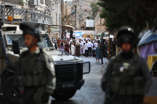 Israeli Soldiers Restrict Palestinian Movement During Settler Tour in Hebron Israeli soldiers restrict the movement of Palestinians and take security measures during a tour by Israeli settlers in the Old City of Hebron, in the West Bank, on October 3, 2026, during the Jewish holiday of Sukkot. Photo by Mamoun Wazwaz apaimages Hebron West Bank Palestinian Territory 031026_Hebron_MW_00(20) Copyright: xapaimagesxMamounxWazwazx xapaimagesx