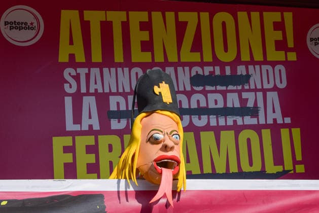 October 3, 2026, Rome, Rome, Italy: A mask representing Prime Minister Giorgia Meloni with a headpiece featuring a fascist symbol positioned on stage during the Potere al Popolo demonstration at Piazza Bocca della VeritÃ in Rome on October 3, 2026. Rome Italy - ZUMAn299 20261003_zip_n299_006 Copyright: xVincenzoxNuzzolesex