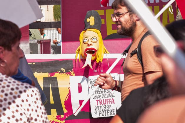 October 3, 2026, Rome, Rome, Italy: A mask representing Prime Minister Giorgia Meloni with a headpiece featuring a fascist symbol positioned on stage during the Potere al Popolo demonstration at Piazza Bocca della VeritÃ in Rome on October 3, 2026. Rome Italy - ZUMAn299 20261003_zip_n299_010 Copyright: xVincenzoxNuzzolesex