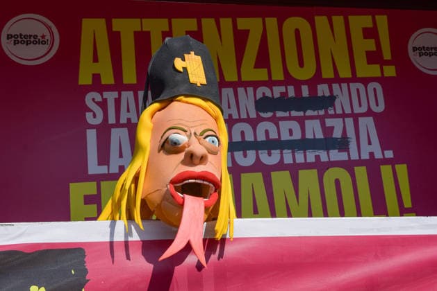 October 3, 2026, Rome, Rome, Italy: A mask representing Prime Minister Giorgia Meloni with a headpiece featuring a fascist symbol positioned on stage during the Potere al Popolo demonstration at Piazza Bocca della VeritÃ in Rome on October 3, 2026. Rome Italy - ZUMAn299 20261003_zip_n299_011 Copyright: xVincenzoxNuzzolesex