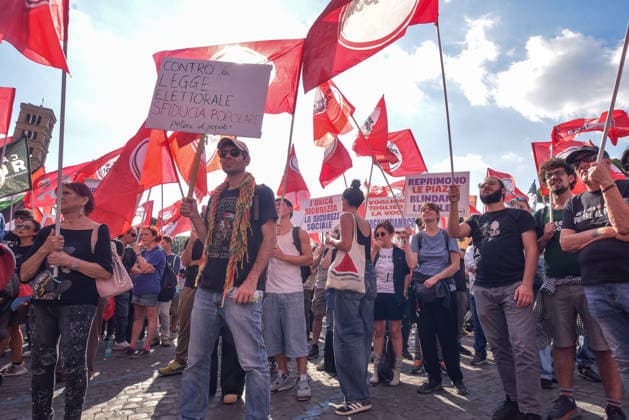 October 3, 2026, Rome, Rome, Italy: Activists and demonstrators hold banners and flags during the Potere al Popolo protest at Piazza Bocca della Verità in Rome on October 3, 2026. Rome Italy - ZUMAn299 20261003_zip_n299_020 Copyright: xVincenzoxNuzzolesex