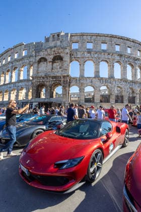 Ferrari Tour stops in Pula Luxury Ferrari sports cars taking part in a Ferrari Tour organized by Ineco Auto, are seen in front of the Roman Arena in Pula, Croatia, on October 3, 2026. While the drivers visit the ancient amphitheatre, local residents gather to watch and admire the vehicles.  SreckoxNiketic PIXSELL