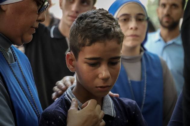 Funeral Held for Christian Mother and Daughter Killed in Gaza City Strike GAZA, PALESTINE OCTOBER 3, 2026: Mourners attended the funeral of Christian mother Maysa Abu Dawood and her daughter Mary at Saint Porphyrius Church in Gaza City on Saturday, after they were killed early in the morning when an Israeli airstrike hit their residential apartment in the city. Mukhtars, community reconciliation figures and members of the Palestinian Civil Defense attended the funeral. The funeral was held at Saint Porphyrius Church, where mourners gathered to pay their respects to the mother and daughter. Gaza Palestine, State of Copyright: x xMohammedxMxSkaikx xJNAxPressx