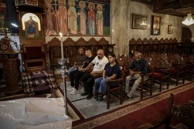 Funeral Held for Christian Mother and Daughter Killed in Gaza City Strike GAZA, PALESTINE OCTOBER 3, 2026: Mourners attended the funeral of Christian mother Maysa Abu Dawood and her daughter Mary at Saint Porphyrius Church in Gaza City on Saturday, after they were killed early in the morning when an Israeli airstrike hit their residential apartment in the city. Mukhtars, community reconciliation figures and members of the Palestinian Civil Defense attended the funeral. The funeral was held at Saint Porphyrius Church, where mourners gathered to pay their respects to the mother and daughter. Gaza Palestine, State of Copyright: x xMohammedxMxSkaikx xJNAxPressx