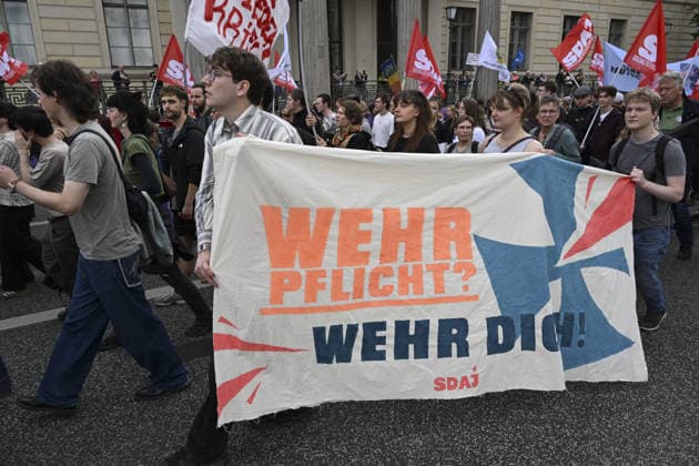Thousands protest rearmament and conscription in Berlin BERLIN, GERMANY - OCTOBER 3: Thousands of people gather at the historic Brandenburg Gate to protest against rearmament, war and compulsory military service in Berlin, Germany, on October 3, 2026. The demonstrators, responding to a call by an initiative made up of various groups and political parties, later march through the city center. Halil Sagirkaya Anadolu Berlin Germany. Editorial use only. Please get in touch for any other usage.  Copyright: x2026xAnadoluxHalilxSagirkayax
