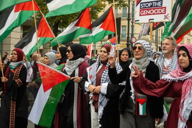 October 3, 2026, Berlin, Germany: BERLIN, GERMANY †OCTOBER 3, 2026: Thousands of people took part in a peace demonstration in central Berlin on German Unity Day. A coalition of peace initiatives, trade unions, and political and civil-society groups organized the protest. The demonstrators focused on military rearmament, the possible reintroduction of conscription, and Germanyâ€⠢s military policy. The march began at the Brandenburg Gate and continued through the government district before concluding with a rally. The demonstration brought together participants expressing opposition to Germanyâ€⠢s current and proposed military policies on a national public holiday. Berlin Germany - ZUMAq101 20261003_zna_q101_087 Copyright: xJessxFlomx