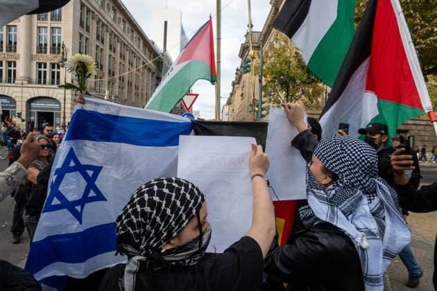October 3, 2026, Berlin, Germany: BERLIN, GERMANY †OCTOBER 3, 2026: Thousands of people took part in a peace demonstration in central Berlin on German Unity Day. A coalition of peace initiatives, trade unions, and political and civil-society groups organized the protest. The demonstrators focused on military rearmament, the possible reintroduction of conscription, and Germanyâ€⠢s military policy. The march began at the Brandenburg Gate and continued through the government district before concluding with a rally. The demonstration brought together participants expressing opposition to Germanyâ€⠢s current and proposed military policies on a national public holiday. Berlin Germany - ZUMAq101 20261003_zna_q101_092 Copyright: xJessxFlomx