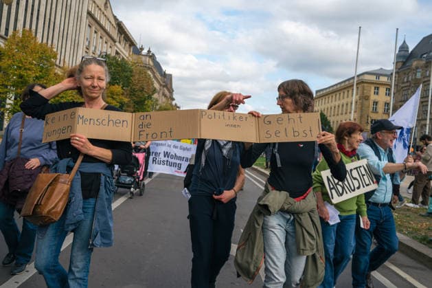 October 3, 2026, Berlin, Berlin, Germany: Thousands of people of all ages, including many school-age teenagers, marched through Berlinâ€⠢s Mitte district to protest mandatory military service, cuts to social services and increased spending on the arms industry. Berlin Germany - ZUMAk201 20261003_zip_k201_016 Copyright: xNikosxKanistrasx