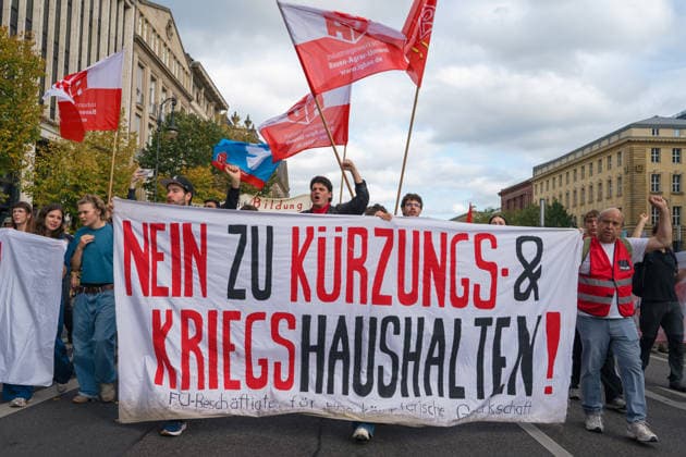 October 3, 2026, Berlin, Berlin, Germany: Thousands of people of all ages, including many school-age teenagers, marched through Berlinâ€⠢s Mitte district to protest mandatory military service, cuts to social services and increased spending on the arms industry. Berlin Germany - ZUMAk201 20261003_zip_k201_018 Copyright: xNikosxKanistrasx