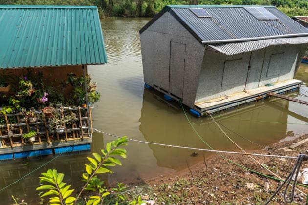 Floating homes offer a way of life adapted to recurrent flooding in Hanoi HANOI, VIETNAM - OCTOBER 3: Residents go about their daily lives in a floating village built in an area that is regularly affected by flooding, with homes designed to rise with changing water levels, as seen in Hanoi, Vietnam, on October 3, 2026. The floating homes allow residents to adapt to recurring floods while continuing to live and work in the area. Magdalena Chodownik Anadolu Hanoi Vietnam. Editorial use only. Please get in touch for any other usage.  Copyright: x2026xAnadoluxMagdalenaxChodownikx