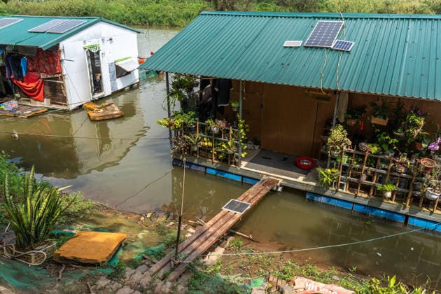 Floating homes offer a way of life adapted to recurrent flooding in Hanoi HANOI, VIETNAM - OCTOBER 3: Residents go about their daily lives in a floating village built in an area that is regularly affected by flooding, with homes designed to rise with changing water levels, as seen in Hanoi, Vietnam, on October 3, 2026. The floating homes allow residents to adapt to recurring floods while continuing to live and work in the area. Magdalena Chodownik Anadolu Hanoi Vietnam. Editorial use only. Please get in touch for any other usage.  Copyright: x2026xAnadoluxMagdalenaxChodownikx