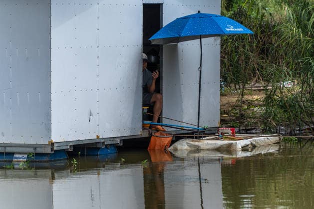 Floating homes offer a way of life adapted to recurrent flooding in Hanoi HANOI, VIETNAM - OCTOBER 3: Residents go about their daily lives in a floating village built in an area that is regularly affected by flooding, with homes designed to rise with changing water levels, as seen in Hanoi, Vietnam, on October 3, 2026. The floating homes allow residents to adapt to recurring floods while continuing to live and work in the area. Magdalena Chodownik Anadolu Hanoi Vietnam. Editorial use only. Please get in touch for any other usage.  Copyright: x2026xAnadoluxMagdalenaxChodownikx