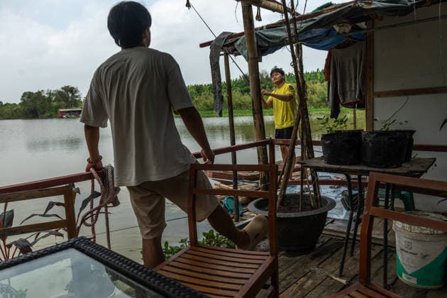 Floating homes offer a way of life adapted to recurrent flooding in Hanoi HANOI, VIETNAM - OCTOBER 3: Residents go about their daily lives in a floating village built in an area that is regularly affected by flooding, with homes designed to rise with changing water levels, as seen in Hanoi, Vietnam, on October 3, 2026. The floating homes allow residents to adapt to recurring floods while continuing to live and work in the area. Magdalena Chodownik Anadolu Hanoi Vietnam. Editorial use only. Please get in touch for any other usage.  Copyright: x2026xAnadoluxMagdalenaxChodownikx