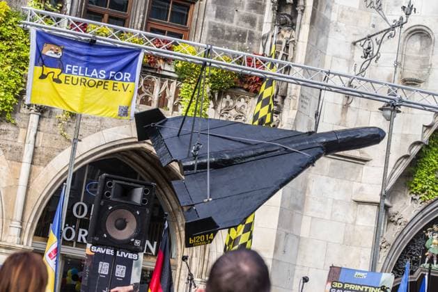 October 3, 2026, Munich, Bavaria, Germany: Thew Ukrainian community of Munich, Germany put a full-size replica of a Shahed drone on display so Germany could see what Ukrainian civilians face daily. Coinciding with the Tag der Deutschen Einheit (Day of German Unity), Ukrainians in Munich, Germany not only celebrated the reunification of East and West Germany, they celebrated Ukrainian unity and made pleas to the world to avoid a humanitarian catastrophe and famine in Oleshky, a city in Ukraineâ€⠢s Kherson region where some 6,000 civilians (with 200 children) are currently under complete isolation via a Russian blockade. Munich Germany - ZUMAb160 20261003_abp_b160_016 Copyright: xSachellexBabbarx