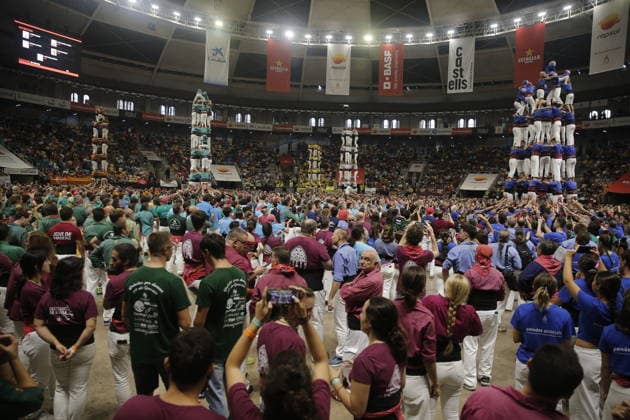 Human tower groups perform in the 30th Concurs de Castells competition in Tarragona TARRAGONA, SPAIN - OCTOBER 3: Members of human tower groups (colles) build intricate human towers (castells) during the competition section of the 30th Concurs de Castells at the Tarraco Arena Placa in Tarragona, Spain on October 3, 2026. The biennial event, recognized as UNESCO Intangible Cultural Heritage, gathers top teams from across Catalonia to construct towering multi-tiered human structures. Senhan Bolelli Anadolu Tarragona Spain. Editorial use only. Please get in touch for any other usage.  Copyright: x2026xAnadoluxSenhanxBolellix