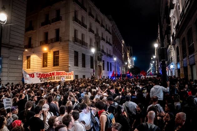 Protest Rally Against the Sol Camp in Madrid: Dozens of people demonstrate against the rally organized by Núcleo Nacional at Puerta del Sol on October 3, 2026, in Madrid, Spain. The Indignados por Espana platform is organizing the demonstration against the Sol encampment, in support of social and national housing, against mass deportations, and in defense of national sovereignty following the invasion of Ceuta. OCTOBER 3, 2026 NUCLEO NACIONAL PROTEST HOUSING FLAG HOODED PROTESTERS POLICE ANTIFASCIST ACTION ANTIFASCISTS POLICE NATIONAL ON FOOT Madrid Madrid Spain  Copyright: xA.xPÃ rezxMecax 7818947