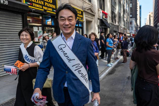 October 3, 2026, New York, New York, USA: A grand marshall for the 2026 NYC Korean Parade walks by. New York USA - ZUMAh214 20261003_znp_h214_003 Copyright: xSDxHerzogx