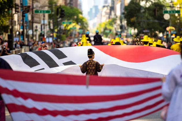 October 3, 2026, New York, New York, USA: A small child holds up their end of the Korean flag at the 2026 NYC Korean parade. New York USA - ZUMAh214 20261003_znp_h214_030 Copyright: xSDxHerzogx