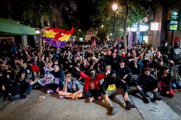 Protest Rally Against the Sol Camp in Madrid: Dozens of people demonstrate against the rally organized by Núcleo Nacional at Puerta del Sol on October 3, 2026, in Madrid, Spain. The platform Indignados por Espana is organizing the demonstration against the Sol encampment, in support of social and national housing, against mass deportations, and in defense of national sovereignty following the invasion of Ceuta. OCTOBER 3, 2026 NUCLEO NACIONAL PROTEST HOUSING FLAG HOODED PROTESTERS POLICE ANTIFASCIST ACTION ANTIFASCISTS POLICE NATIONAL ON FOOT Madrid Madrid Spain  Copyright: xA.xPÃ rezxMecax 7818996