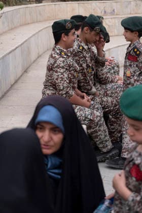 Opening Ceremony Of Second City-Square Military Training Camp Two veiled women converse while Iranian schoolboys wearing Iranian Army military uniforms speak with each other during the opening ceremony of the second city-square military training camp for self-sacrificing forces in downtown Tehran, Iran, on October 3, 2026. The camp was established by the Basij paramilitary force, with personnel from the Islamic Republic of Iran Army responsible for training the volunteers. Tehran Tehran Iran  Copyright: xMortezaxNikoubazlx originalFilename: nikoubazl-openingc261003_npbd1.jpg