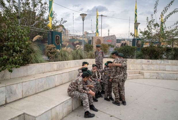 Opening Ceremony Of Second City-Square Military Training Camp Iranian schoolboys wearing Iranian Army uniforms gather in a square in downtown Tehran, Iran, on October 3, 2026, to prepare for the opening ceremony of the second city-square military training camp for self-sacrificing forces. The camp was established by the Basij paramilitary force, with personnel from the Islamic Republic of Iran Army responsible for training the volunteers. Tehran Tehran Iran  Copyright: xMortezaxNikoubazlx originalFilename: nikoubazl-openingc261003_npfCf.jpg