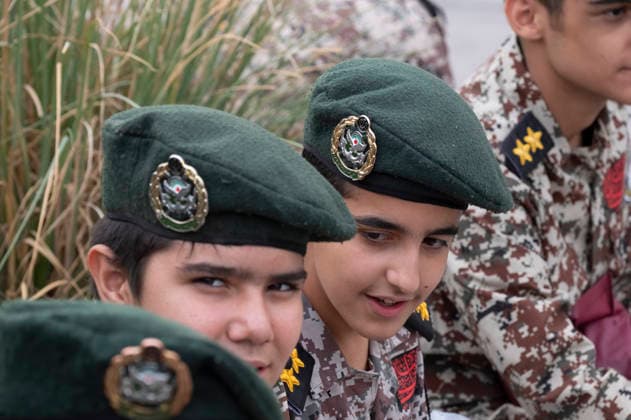 Opening Ceremony Of Second City-Square Military Training Camp Iranian schoolboys wearing military uniforms sit together during the opening ceremony of the second city-square military training camp for self-sacrificing forces in downtown Tehran, Iran, on October 3, 2026. The camp was established by the Basij paramilitary force, with personnel from the Islamic Republic of Iran Army responsible for training the volunteers. Tehran Tehran Iran  Copyright: xMortezaxNikoubazlx originalFilename: nikoubazl-openingc261003_npo4f.jpg