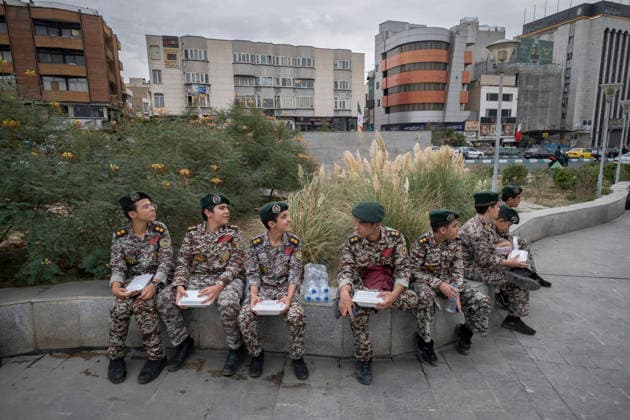 Opening Ceremony Of Second City-Square Military Training Camp Iranian schoolboys wearing Iranian Army military uniforms hold food containers as they prepare to take part in the opening ceremony of the second city-square military training camp for self-sacrificing forces in downtown Tehran, Iran, on October 3, 2026. The camp was established by the Basij paramilitary force, with personnel from the Islamic Republic of Iran Army responsible for training the volunteers. Tehran Tehran Iran  Copyright: xMortezaxNikoubazlx originalFilename: nikoubazl-openingc261003_npq5N.jpg