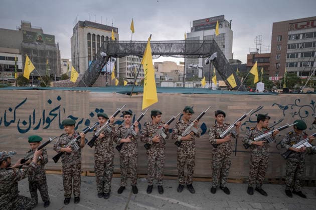 Opening Ceremony Of Second City-Square Military Training Camp Iranian schoolboys wearing military uniforms hold rifles during the opening ceremony of the second city-square military training camp for self-sacrificing forces in downtown Tehran, Iran, on October 3, 2026. The camp was established by the Basij paramilitary force, with personnel from the Islamic Republic of Iran Army responsible for training the volunteers. Tehran Tehran Iran  Copyright: xMortezaxNikoubazlx originalFilename: nikoubazl-openingc261003_nput2.jpg