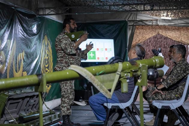 Opening Ceremony Of Second City-Square Military Training Camp An Iranian Army serviceman demonstrates the operation of a shoulder-launched weapon to volunteers during the opening ceremony of the second city-square military training camp for self-sacrificing forces in downtown Tehran, Iran, on October 3, 2026. The camp was established by the Basij paramilitary force, with personnel from the Islamic Republic of Iran Army responsible for training the volunteers. Tehran Tehran Iran  Copyright: xMortezaxNikoubazlx originalFilename: nikoubazl-openingc261003_npxw6.jpg