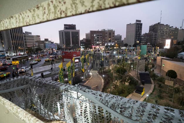 Daily Life Around A City-Square Military Training Camps A view of the second city-square military training camp for self-sacrificing forces is seen through a window of a guard tower in downtown Tehran, Iran, on October 3, 2026. The camp was established by the Basij paramilitary force, with personnel from the Islamic Republic of Iran Army responsible for training the volunteers. Tehran Tehran Iran  Copyright: xMortezaxNikoubazlx originalFilename: nikoubazl-dailylif261003_npWNY