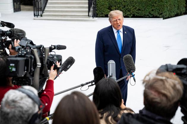 October 3, 2026, Washington, District Of Columbia, USA: United States President Donald J Trump speaks to members of the media before boarding Marine One on the South Lawn of the White House, in Washington, DC, USA, 3 October 2026. President Trump is traveling to Ohio for a rally as he campaigns with Republican Party candidates before midterm elections Washington USA - ZUMAs152 20261003_faa_s152_010 Copyright: xGraemexSloan-PoolxviaxCNPx