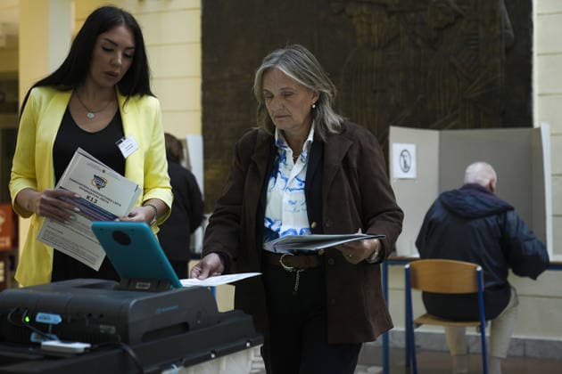 Voters cast ballots in Sarajevo as Bosnia and Herzegovina holds general elections SARAJEVO, BOSNIA AND HERZEGOVINA - OCTOBER 04: Voters cast their ballots as polling stations open for the 2026 General Elections in Sarajevo, Bosnia and Herzegovina on October 04, 2026. The nationwide vote features the inaugural use of new electoral technologies, including biometric voter identification, optical ballot scanners, and automated result transmission systems. Citizens are voting to elect members of the tripartite Presidency of Bosnia and Herzegovina, deputies to the Parliamentary Assembly, the Federation of BiH Parliament, the President and Vice Presidents of Republika Srpska, the National Assembly of Republika Srpska, and cantonal assemblies. Sami Copyright: x2026xAnadoluxSamirxJordamovicx