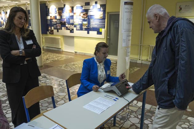 Voters cast ballots in Sarajevo as Bosnia and Herzegovina holds general elections SARAJEVO, BOSNIA AND HERZEGOVINA - OCTOBER 04: Voters cast their ballots as polling stations open for the 2026 General Elections in Sarajevo, Bosnia and Herzegovina on October 04, 2026. The nationwide vote features the inaugural use of new electoral technologies, including biometric voter identification, optical ballot scanners, and automated result transmission systems. Citizens are voting to elect members of the tripartite Presidency of Bosnia and Herzegovina, deputies to the Parliamentary Assembly, the Federation of BiH Parliament, the President and Vice Presidents of Republika Srpska, the National Assembly of Republika Srpska, and cantonal assemblies. Sami Copyright: x2026xAnadoluxSamirxJordamovicx