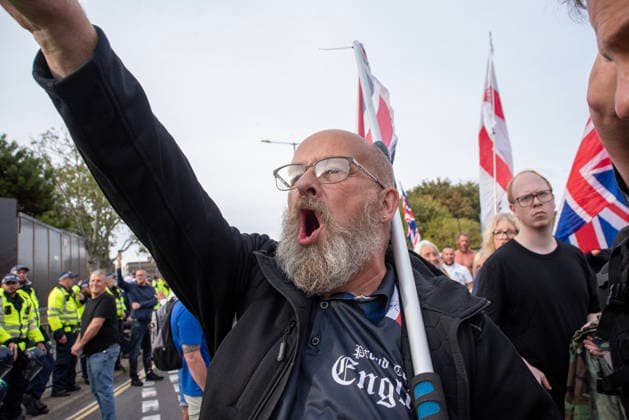 October 3, 2026, Dover, United Kingdom: A far-right protester shouts abusive slogans on to the antifascist protesters during a demonstration in Dover. Supporters of the English Defence League (EDL) gathered in Dover, UK to march through the town all the way to the harbour. English Defence League is an extreme far-right and Islamophobic organisation. It was founded by Tommy Robinson (pseudonym of Steven Yaxley-Lennon) in 2009. Dover United Kingdom  - ZUMAs197 20261003_aaa_s197_247 Copyright: xKrisztianxElekx
