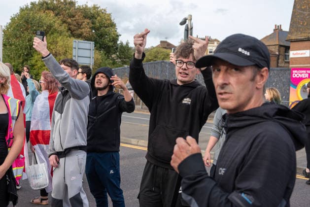 October 3, 2026, Dover, United Kingdom: Far-right protesters show gestures to the antifascist counter-protesters during a demonstration in Dover. Supporters of the English Defence League (EDL) gathered in Dover, UK to march through the town all the way to the harbour. English Defence League is an extreme far-right and Islamophobic organisation. It was founded by Tommy Robinson (pseudonym of Steven Yaxley-Lennon) in 2009. Dover United Kingdom  - ZUMAs197 20261003_aaa_s197_259 Copyright: xKrisztianxElekx