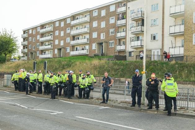 October 3, 2026, Dover, United Kingdom of Great Britain and Northern Ireland: DOVER, UNITED KINGDOM, OCTOBER 3, 2026: Anti-immigration protesters and anti-racism counter-protesters gather during rival demonstrations in Dover, Kent. Anti-immigration demonstrators carrying Union flags and St George s flags displayed banners calling for deportations and an end to small-boat crossings, while counter-protesters gathered nearby. Police maintained a significant presence between the groups and monitored the demonstrations. Dover United Kingdom of Great Britain and Northern Ireland - ZUMAq101 20261003_zna_q101_207 Copyright: xMarcxLewisx