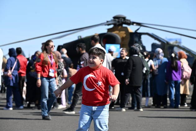 TEKNOFEST Southeast in Turkiye s Sanliurfa SANLIURFA, TURKIYE - OCTOBER 04: A boy wearing a Turkish flag T-shirt attends the Aviation, Space and Technology Festival (TEKNOFEST), the world s largest aviation, space and technology festival, at Sanliurfa GAP Airport during its 15th edition in Sanliurfa, Turkiye, on October 04, 2026. The festival is organized by the Turkish Ministry of Industry and Technology and the T3 Foundation, with Anadolu serving as its Global Communication Partner. Adsiz Gunebakan Anadolu Sanliurfa Turkey. Editorial use only. Please get in touch for any other usage.  Copyright: x2026xAnadoluxAdsizxGunebakanx